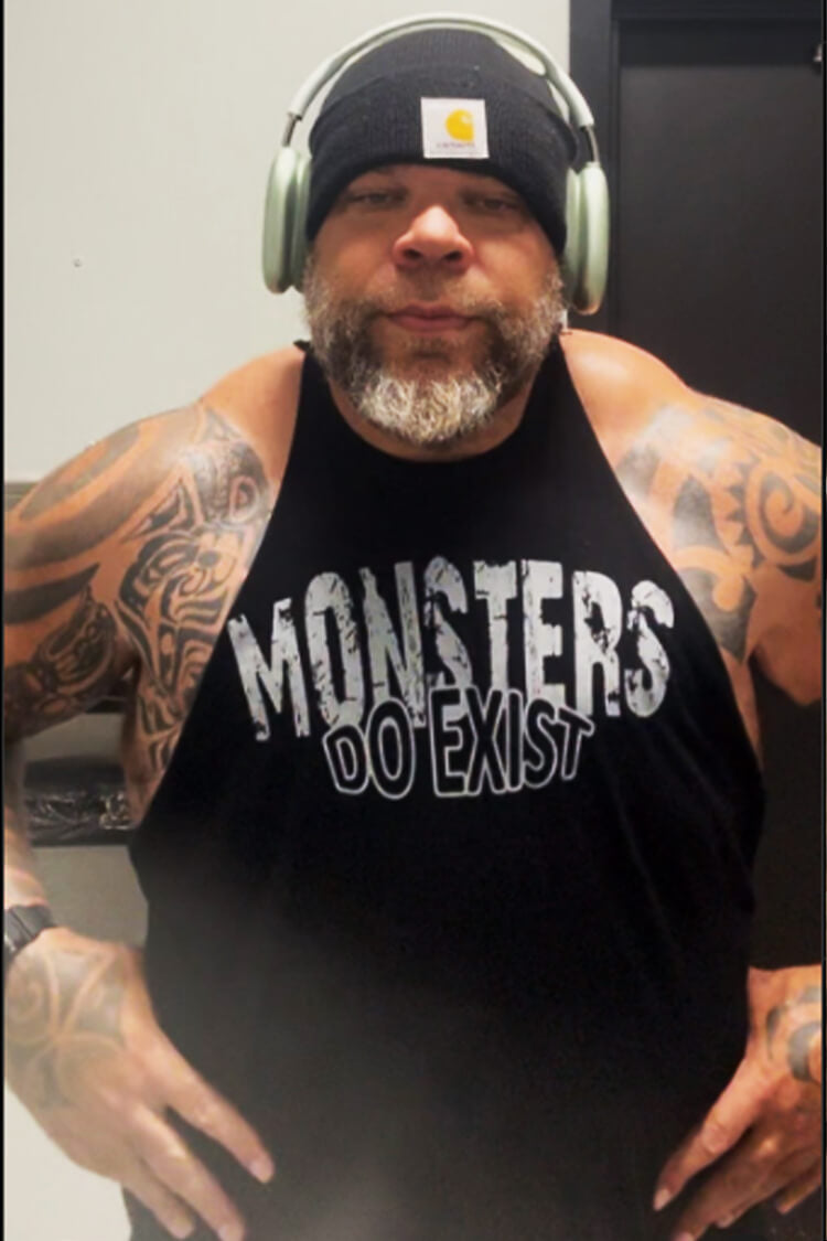 Tyrus wearing a Black Monsters Do Exist Iron Gods T-Shirt
